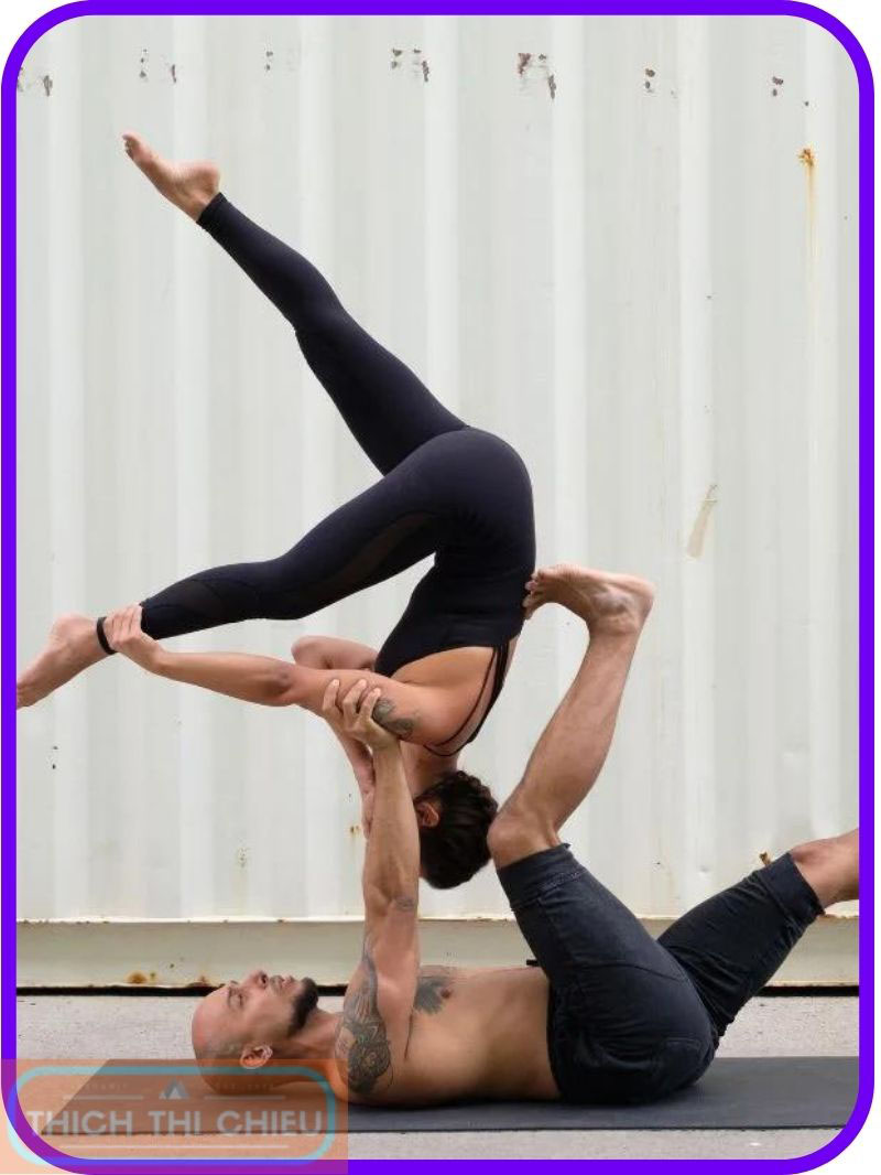Premium Photo | Young women doing balance pose in acroyoga class