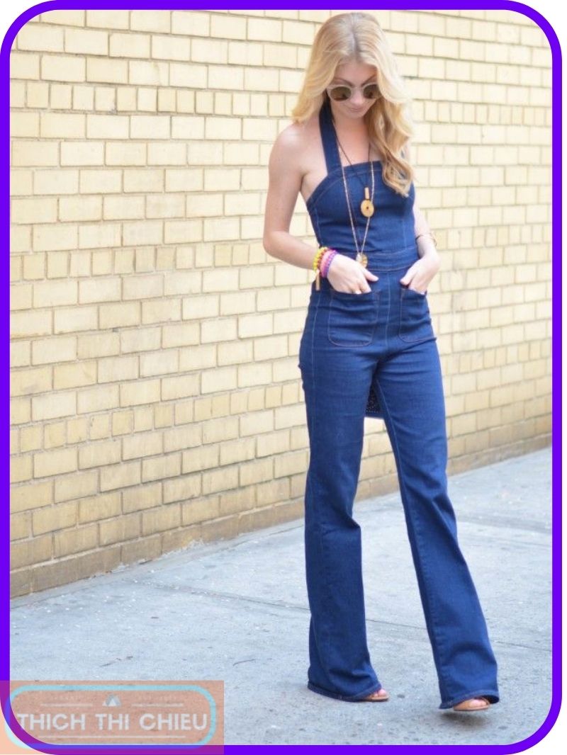 Mom jeans with a jumpsuit and a statement necklace