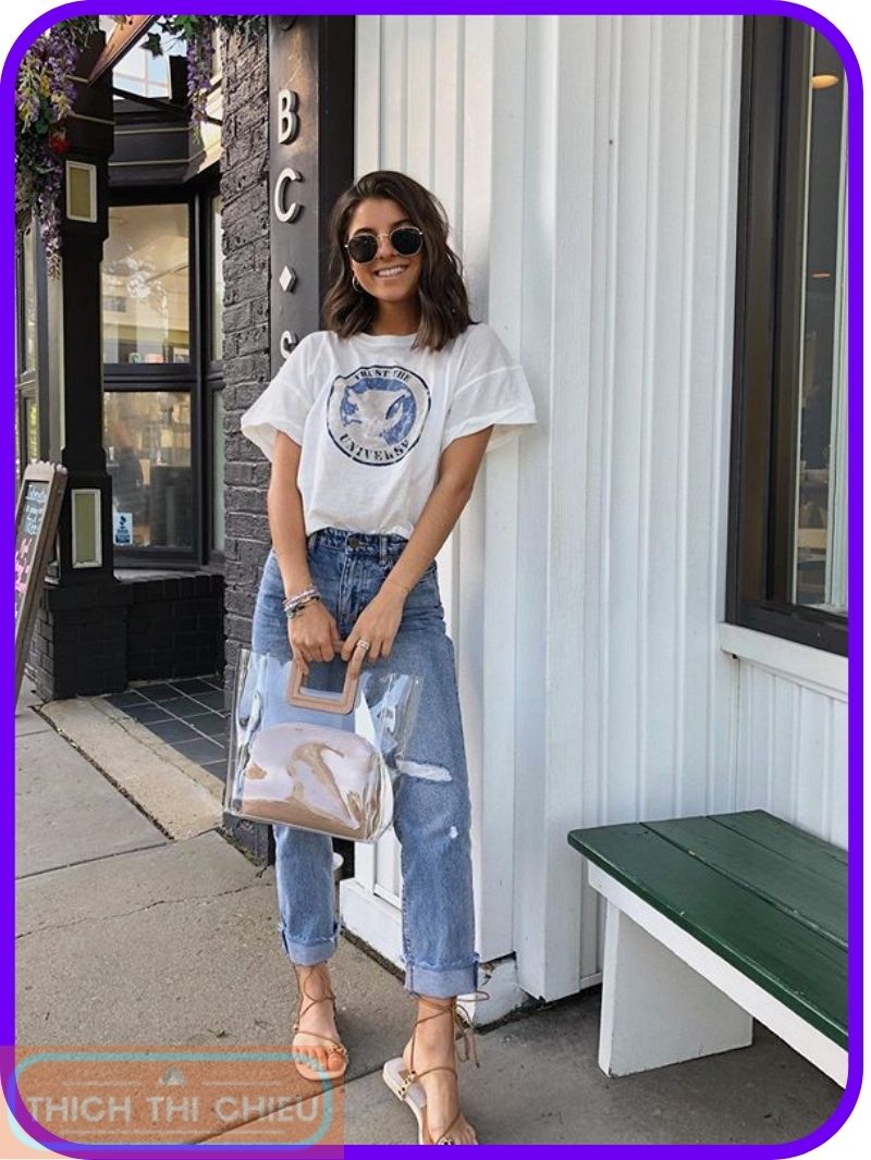 Mom jeans with a graphic tee and sandals