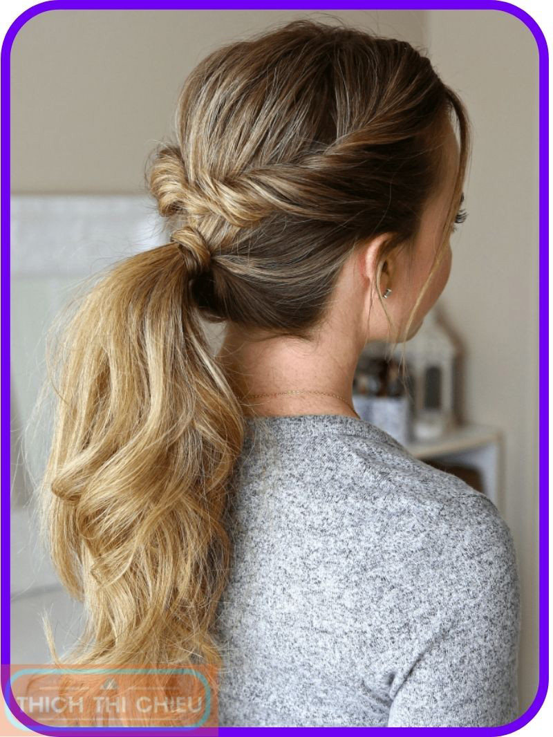 Twisted ponytail with a side part